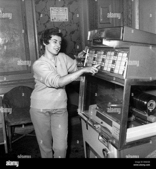 woman-selected-tracks-from-juke-box-1960-B5B2GB.jpg